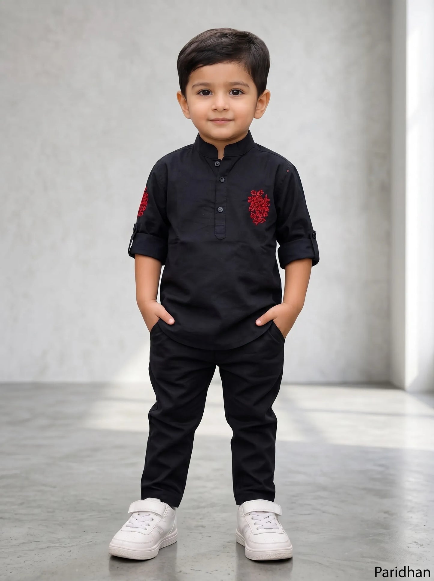 Boy in a black ethnic kurta and matching pant set by Boyz Fun