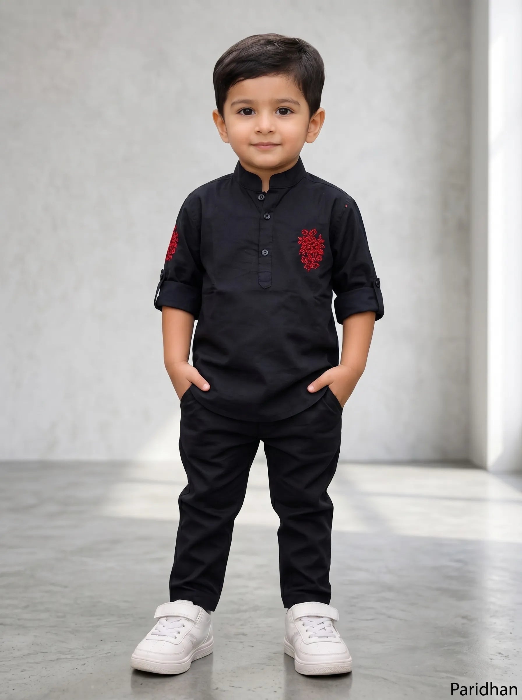 Boy in a black ethnic kurta and matching pant set by Boyz Fun