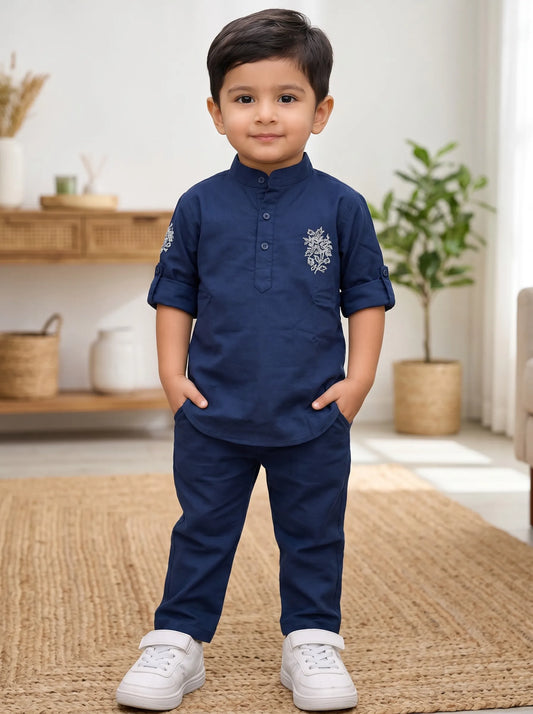 Boy in a blue ethnic kurta and matching pant set by Boyz Fun