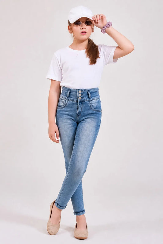 Girl in stone blue triple-button ankle skinny jeans with a white tee, Gilly Billy