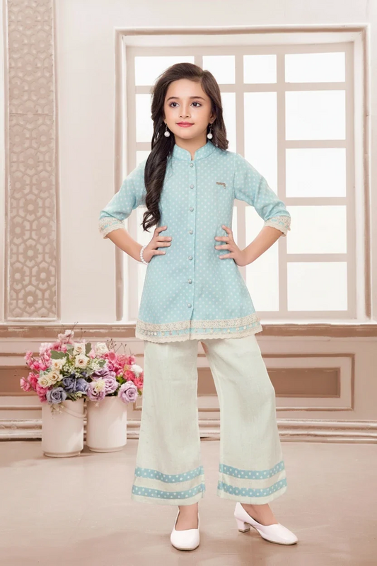Girl in a blue polka dot kurta and palazzo suit by Mini Angel