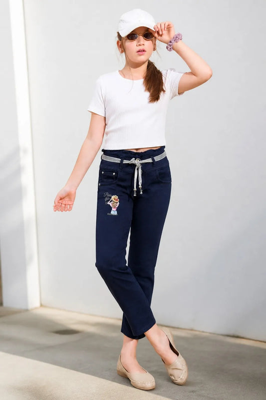 Girl in blue printed tie-waist straight jeans with a white tee, Gilly Billy