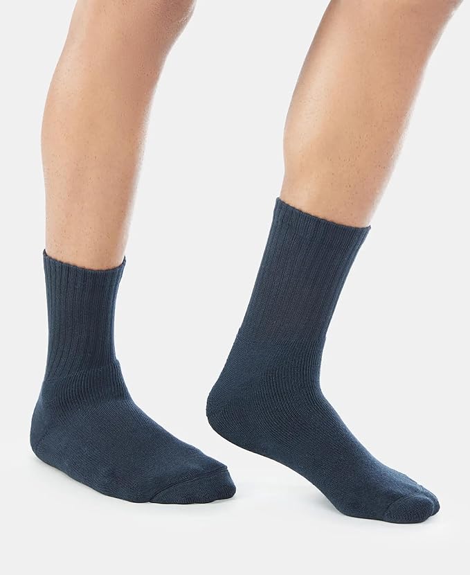 Jockey charcoal melange crew length cotton terry socks worn by a model