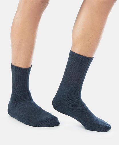 Jockey charcoal melange crew length cotton terry socks worn by a model