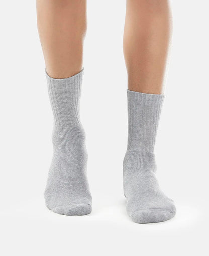 Model wearing Jockey light grey crew length cotton terry socks