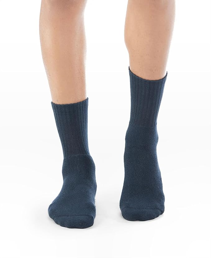 Jockey black crew length cotton terry socks worn by a model