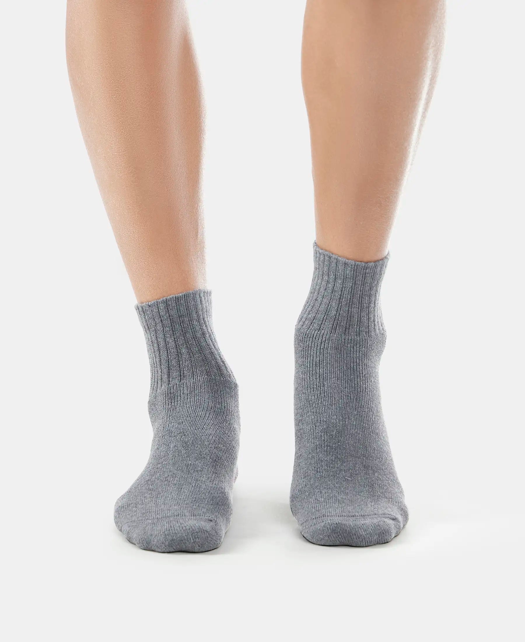 Model wearing Jockey charcoal melange ankle length cotton terry socks