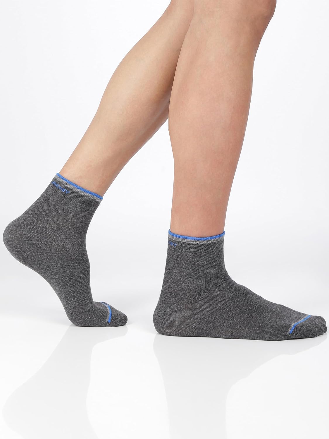 Front view of Jockey charcoal ankle length compact cotton socks on a model