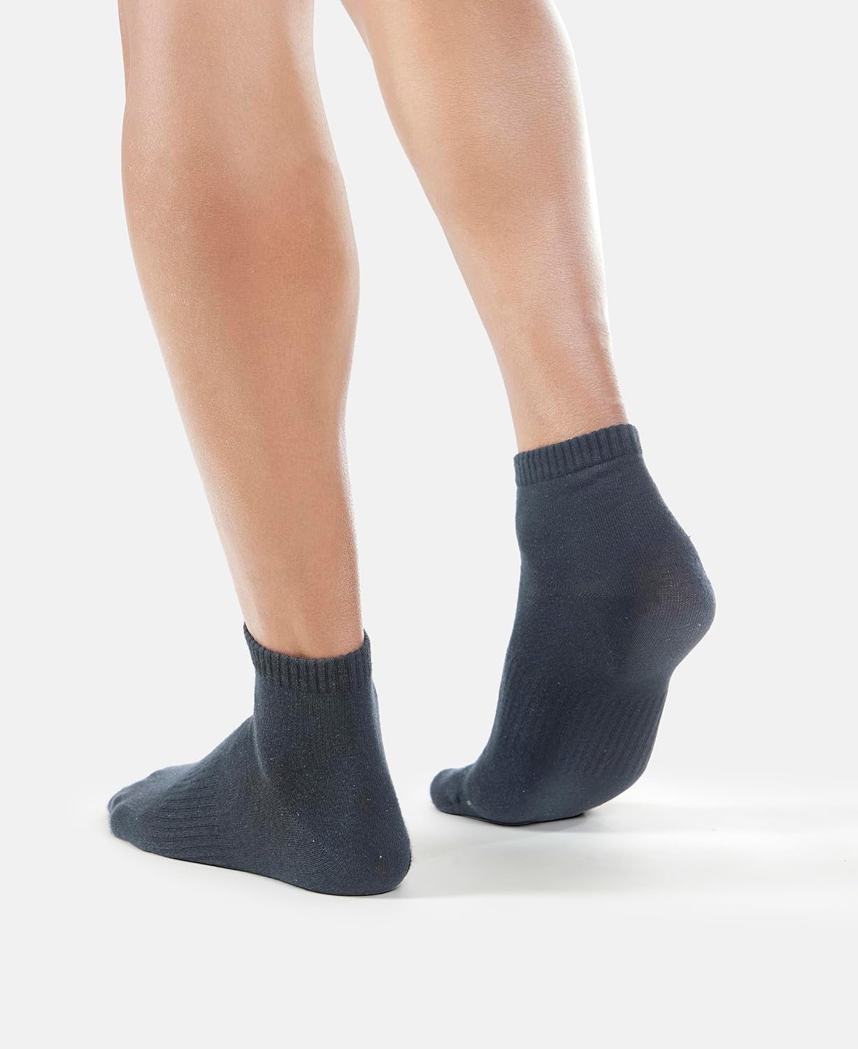 Front view of Jockey navy athleisure ankle length socks on a model