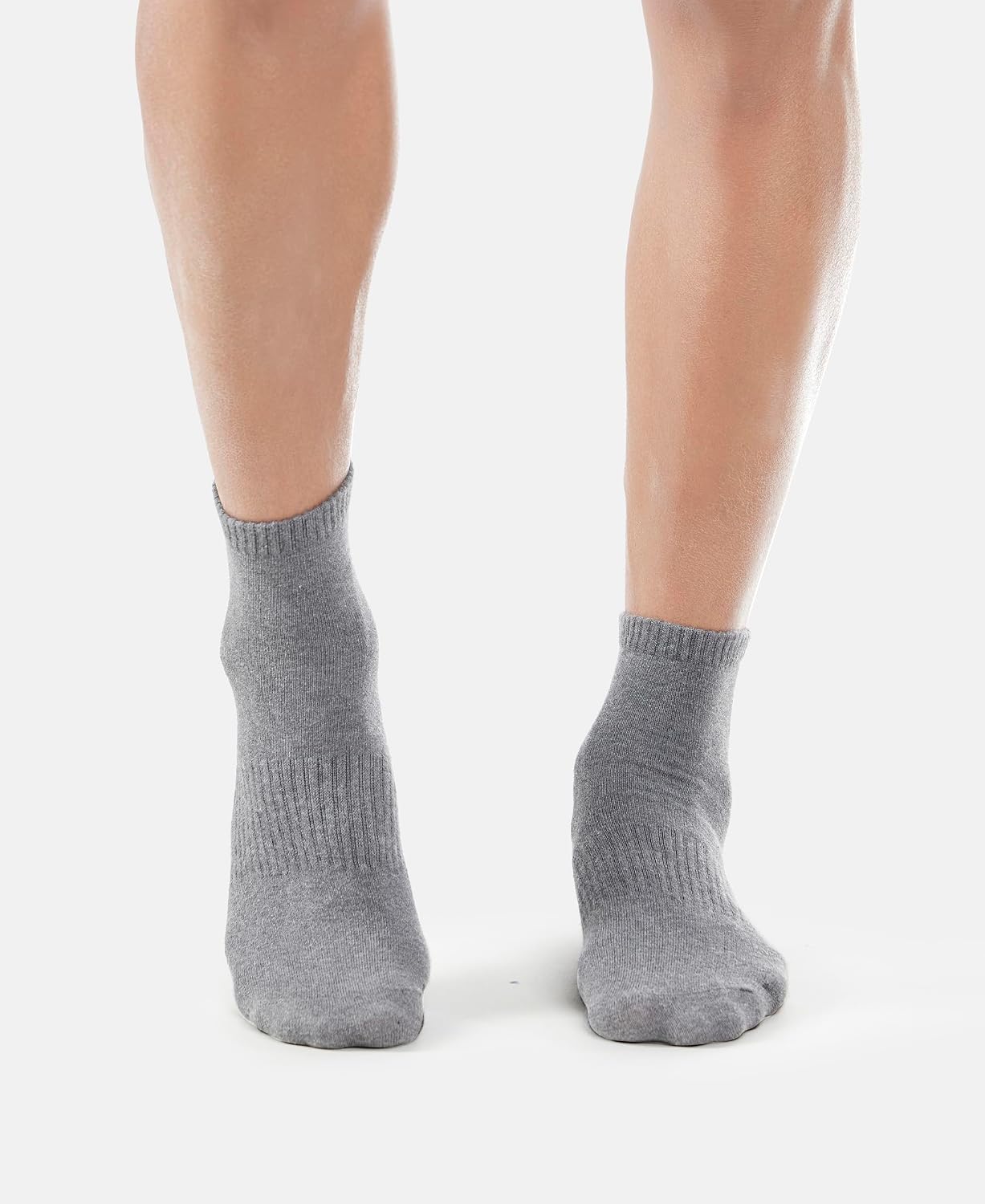 Model wearing Jockey grey athleisure ankle length socks