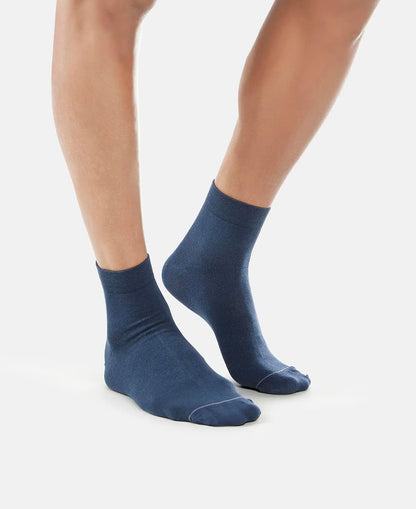 Model wearing Jockey navy international ankle length socks