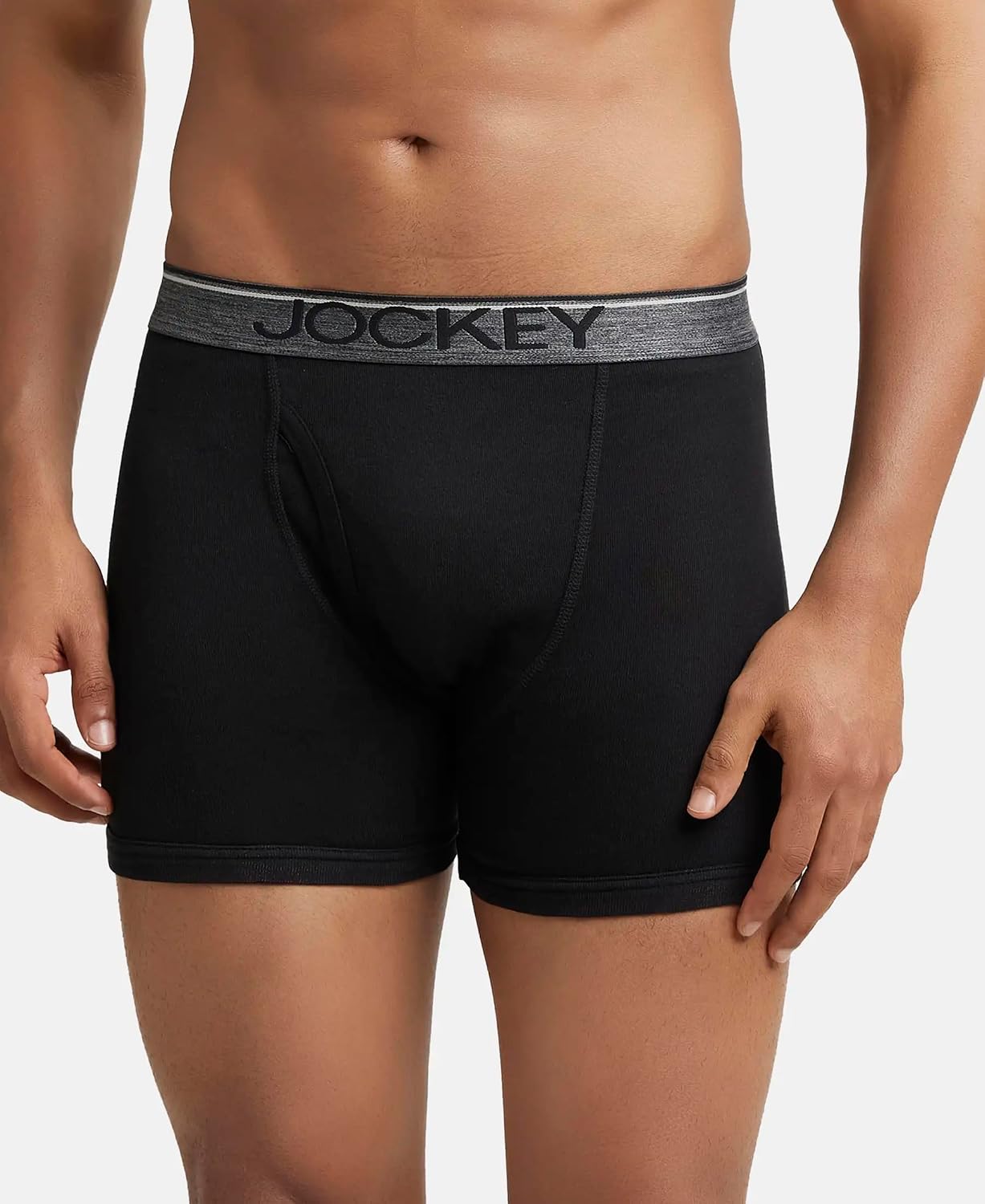 Jockey black cotton boxer brief shown at an angle to show the longer leg length
