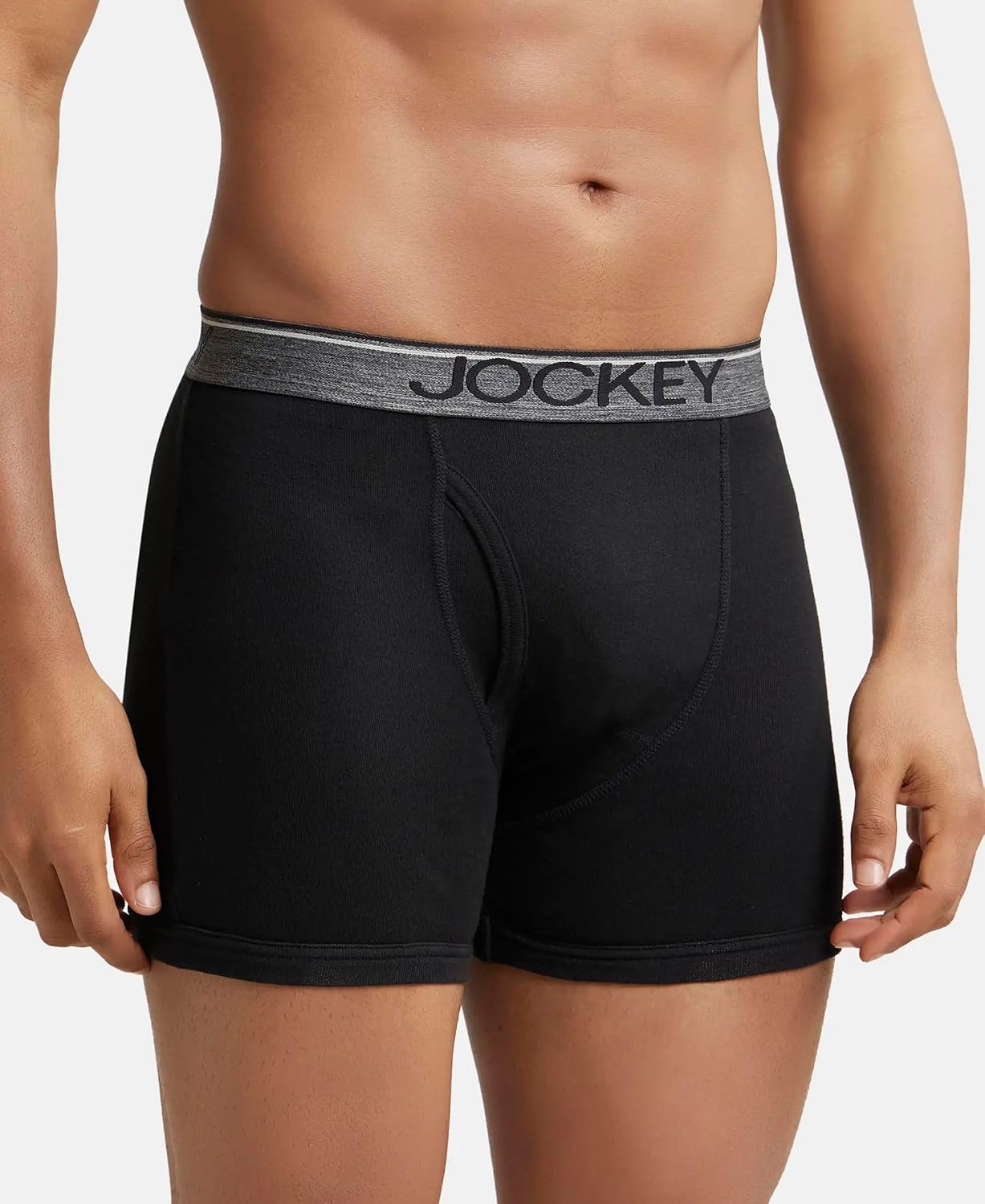 Side view of a Jockey men's black cotton boxer brief on a model