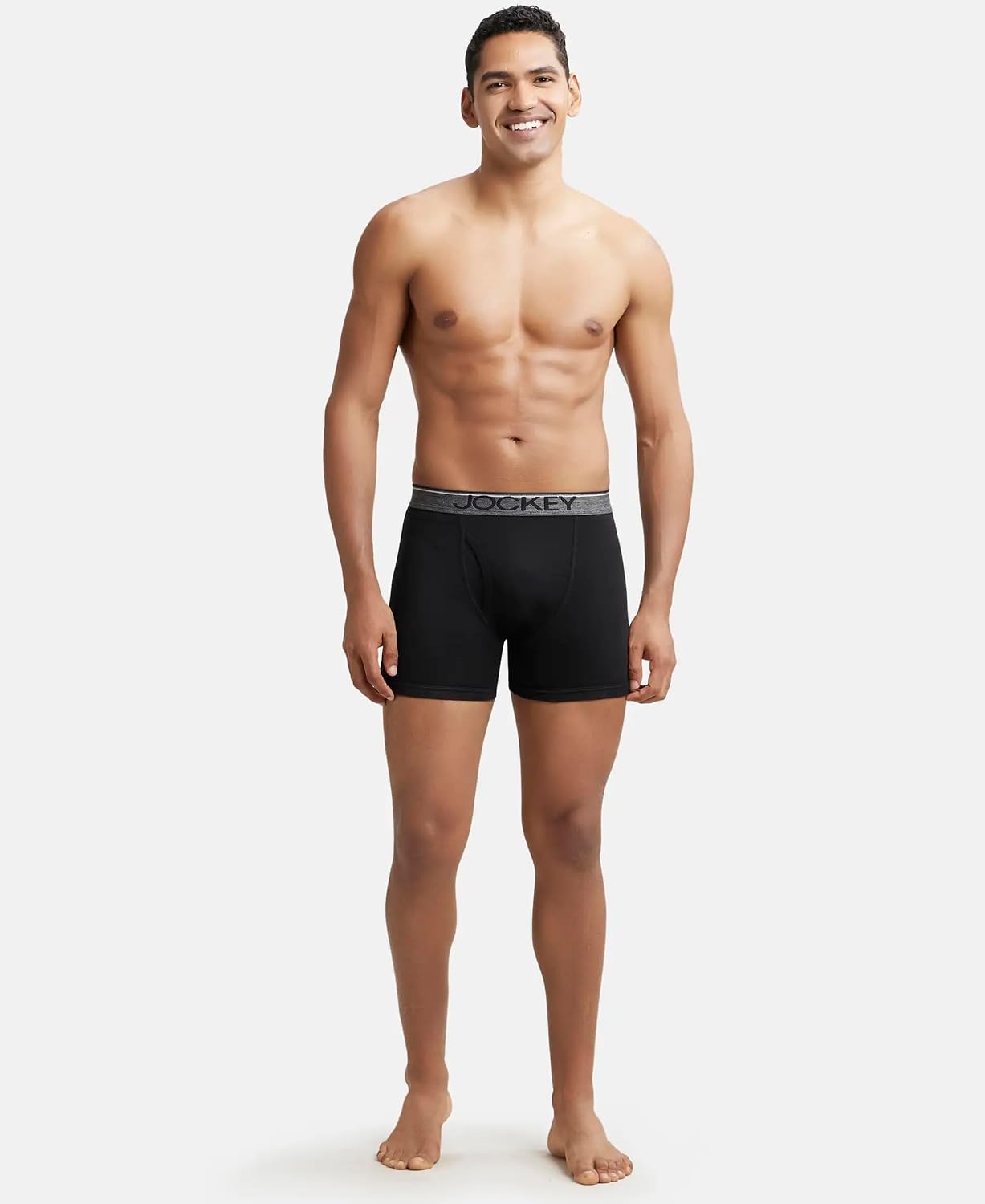 Full-length view of a model wearing Jockey black cotton boxer briefs