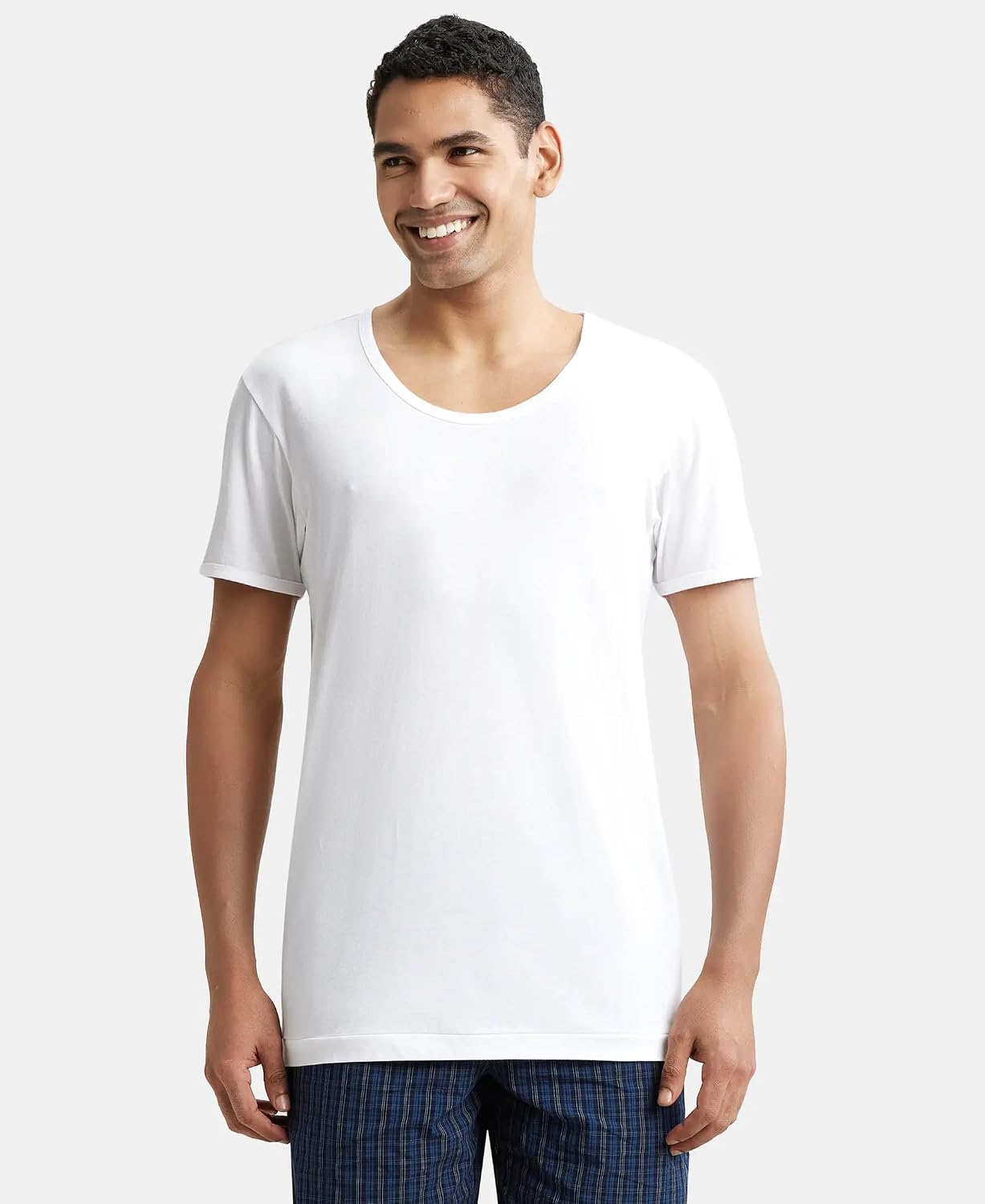 Jockey men's white half sleeve cotton vest, front view on model