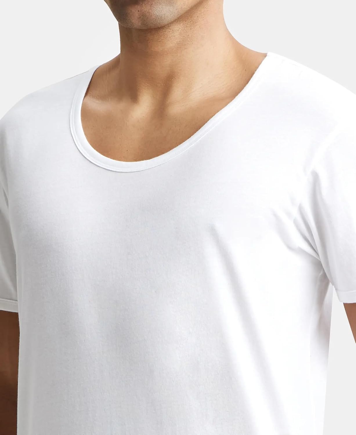 Close-up of the round neckline on a Jockey men's white half sleeve vest