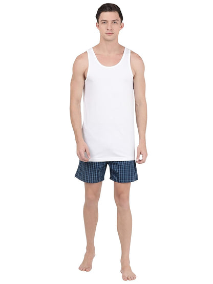Full-length view of a model in a Jockey white sleeveless vest and shorts