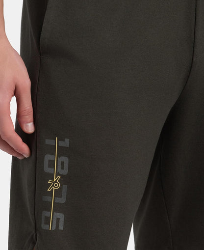 Close-up of the Jockey branding on the leg of olive cotton shorts