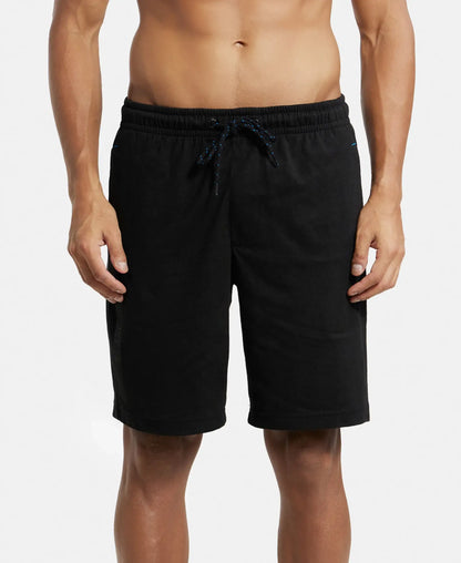 Jockey men's straight fit cotton shorts in black, worn by a model
