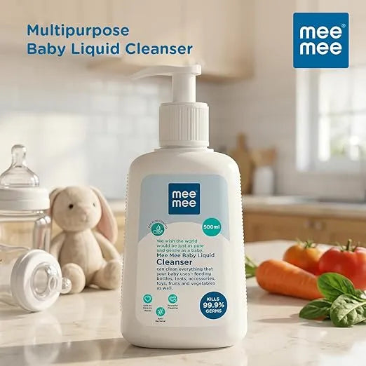 Mee Mee multipurpose baby liquid cleanser on a kitchen counter with bottles and toys