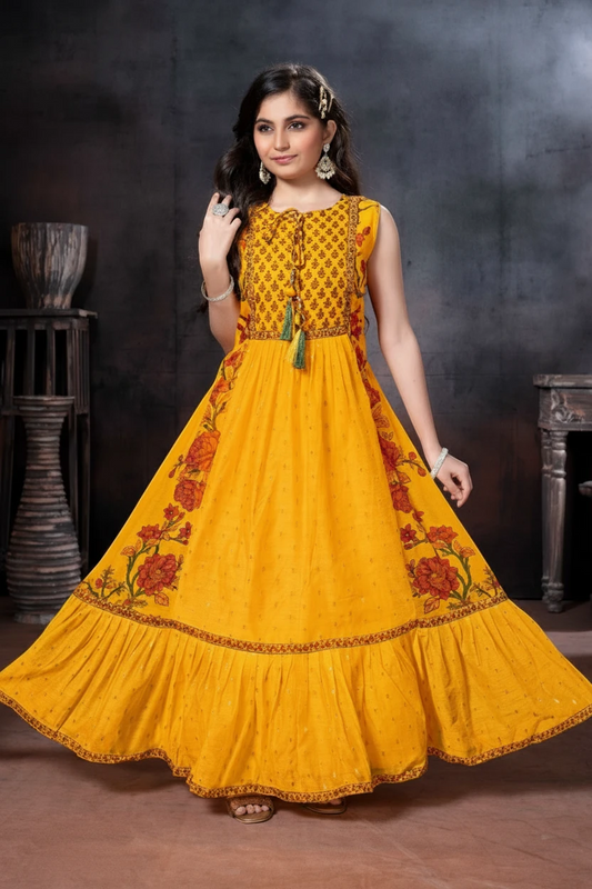 Girl in a yellow floral tiered anarkali gown by Bimbee