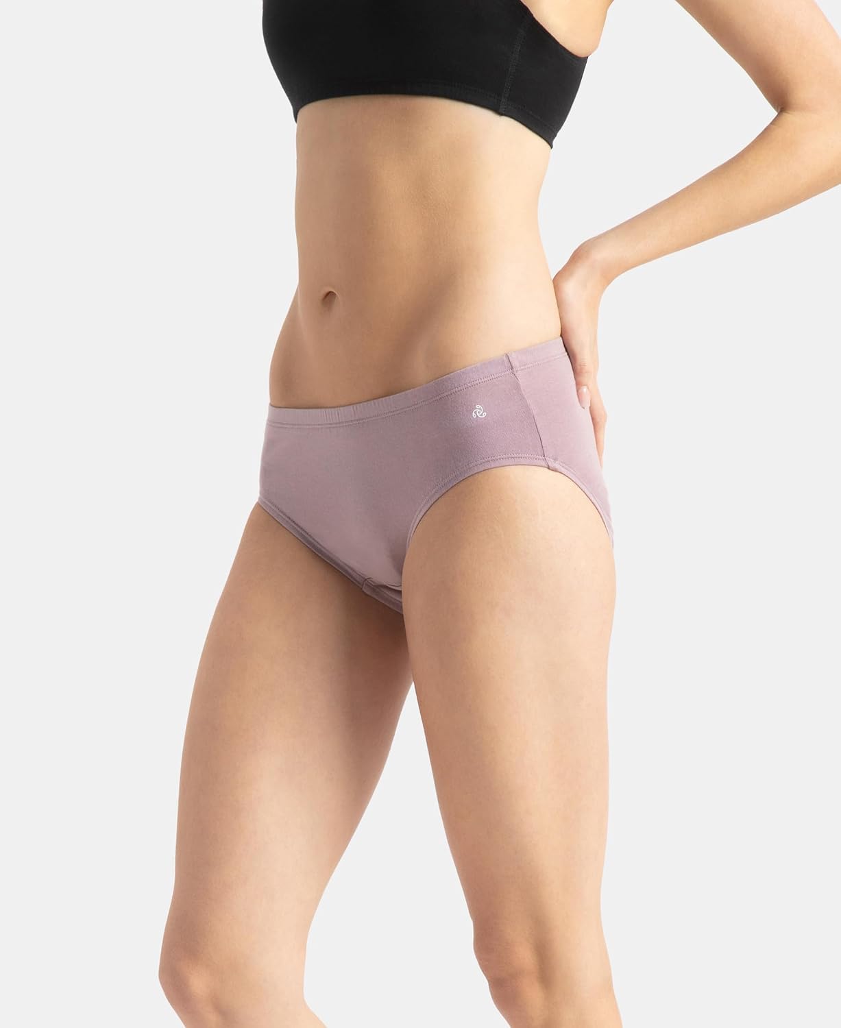 Model with hand on hip wearing a Jockey mauve stretch hipster panty