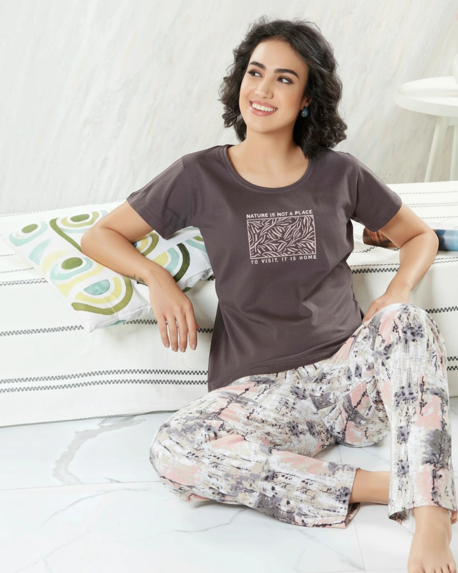 Woman in a brown nature slogan tee and floral printed pyjama, In Touche night suit