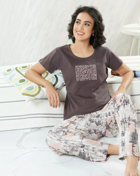 Woman in a brown nature slogan tee and floral printed pyjama, In Touche night suit