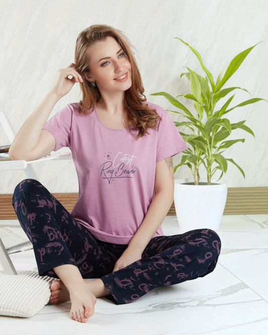 Woman in a pink printed tee and navy printed pyjama, In Touche cotton night suit
