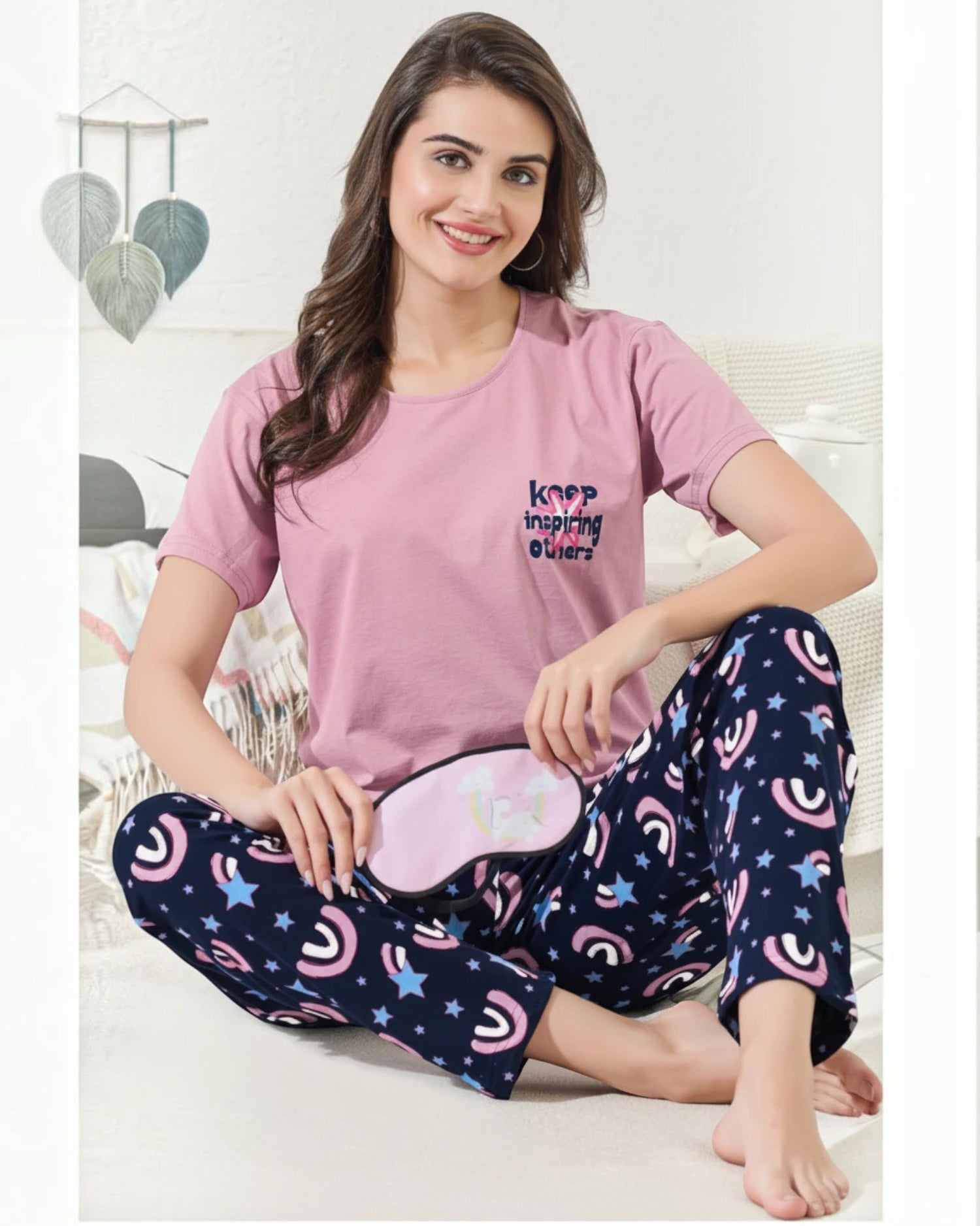 Woman in a pink Keep Inspiring tee and navy printed pyjama, In Touche cotton night suit