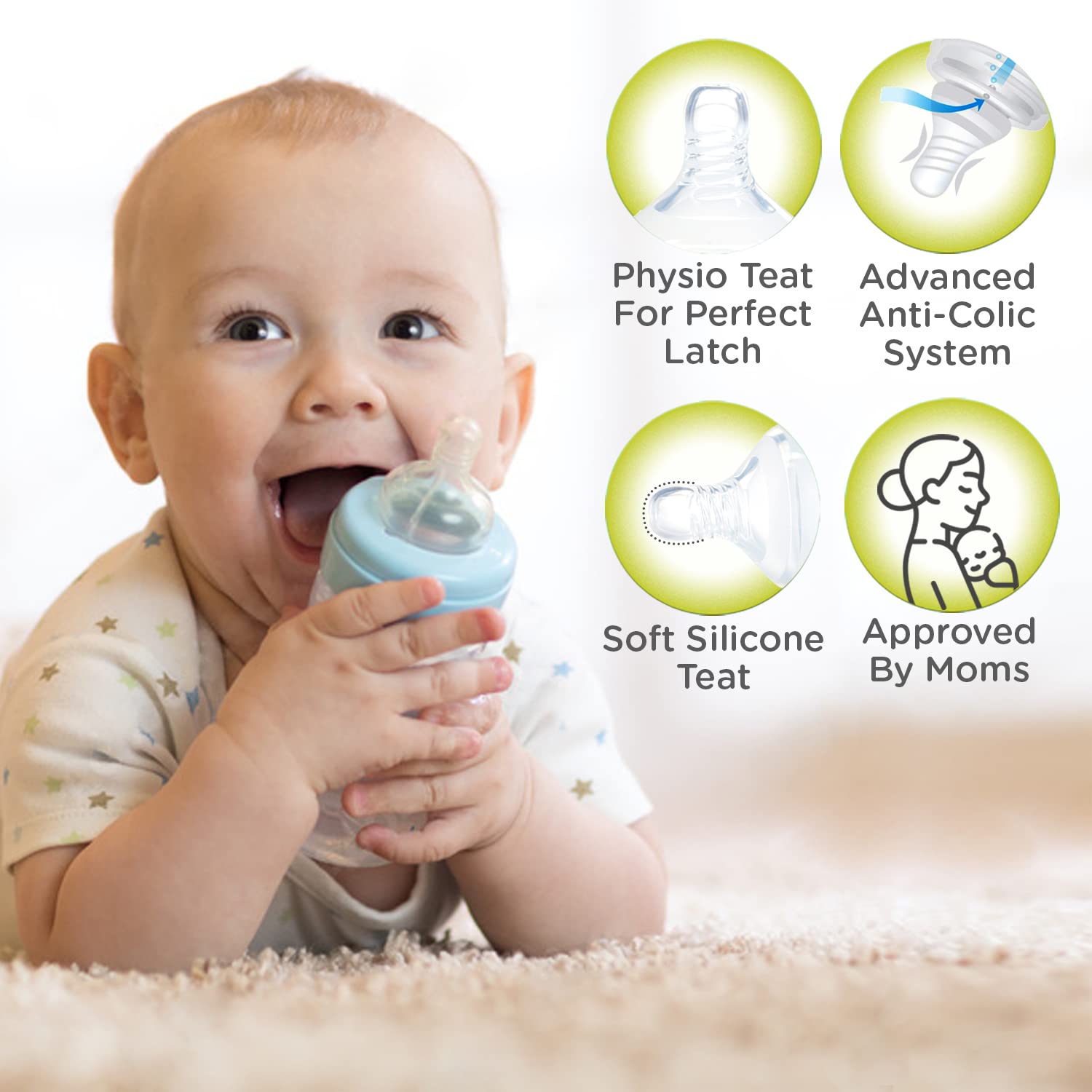 Baby holding a Mee Mee glass feeding bottle with anti-colic system