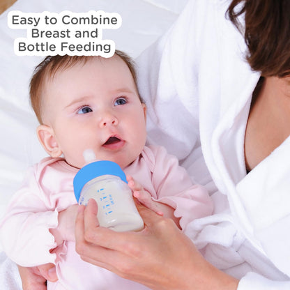 Mother using a Mee Mee Easy Flo bottle, easy to combine breast and bottle feeding