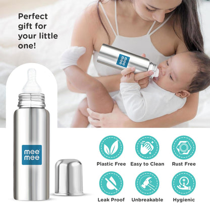 Mother feeding a baby with the Mee Mee premium steel bottle, a gift set option