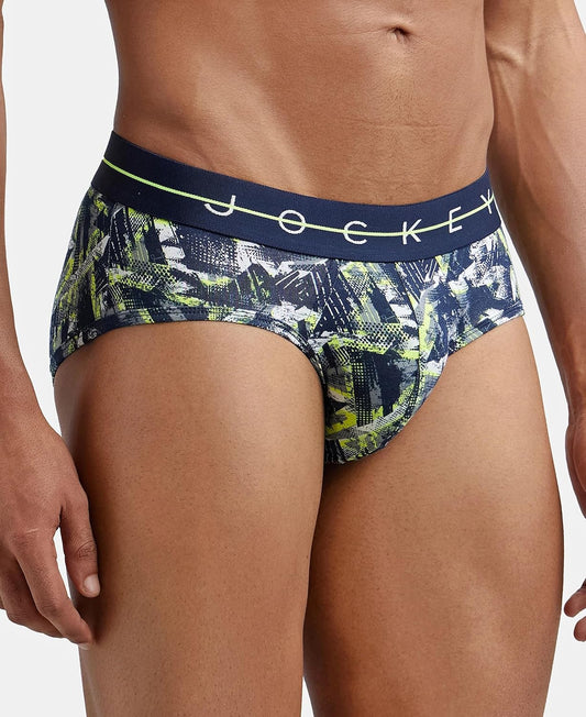Jockey printed stretch brief in navy and green tropical print, angled view