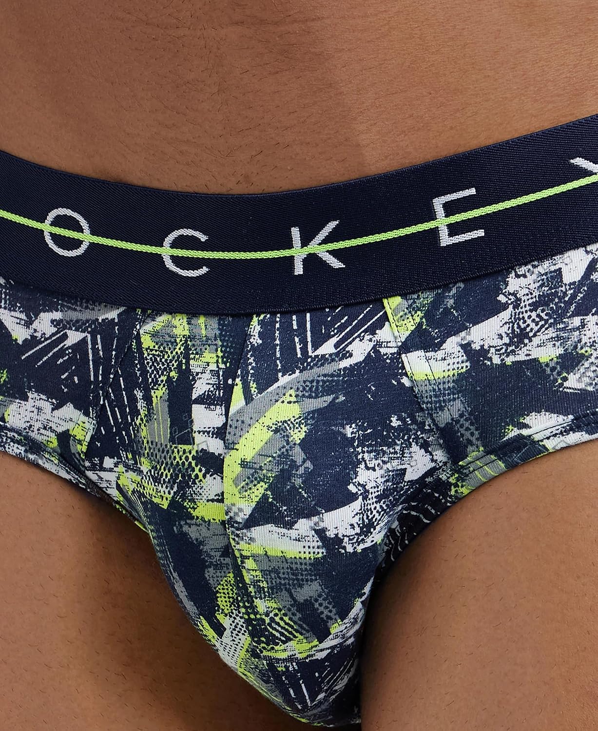 Close-up of the Jockey logo waistband on a printed navy stretch brief