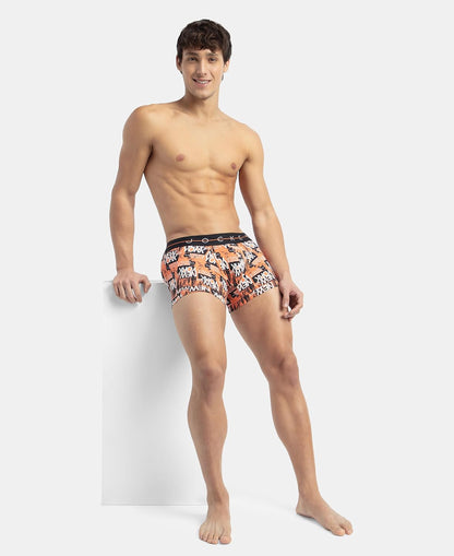 Rear full-length view of a model in Jockey printed stretch trunks
