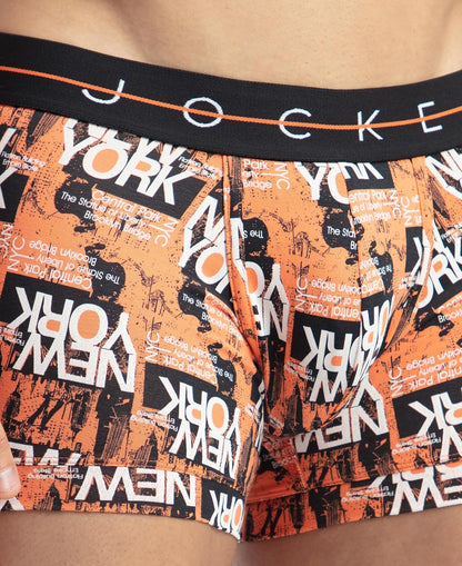 Close-up of the Jockey waistband on an orange New York print stretch trunk