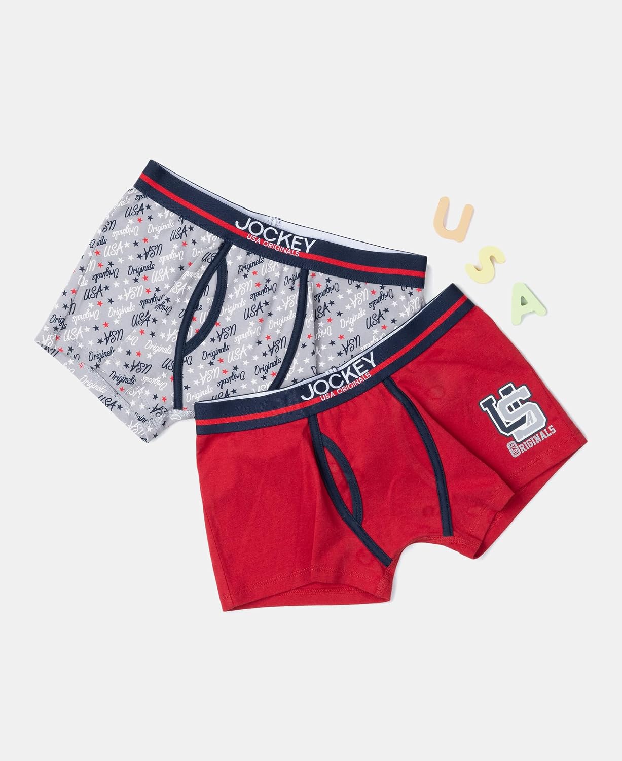 Jockey boys ultrasoft trunks in grey print and red, styled flat lay