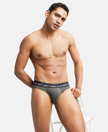 Model standing in Jockey cotton rib briefs, full body shot