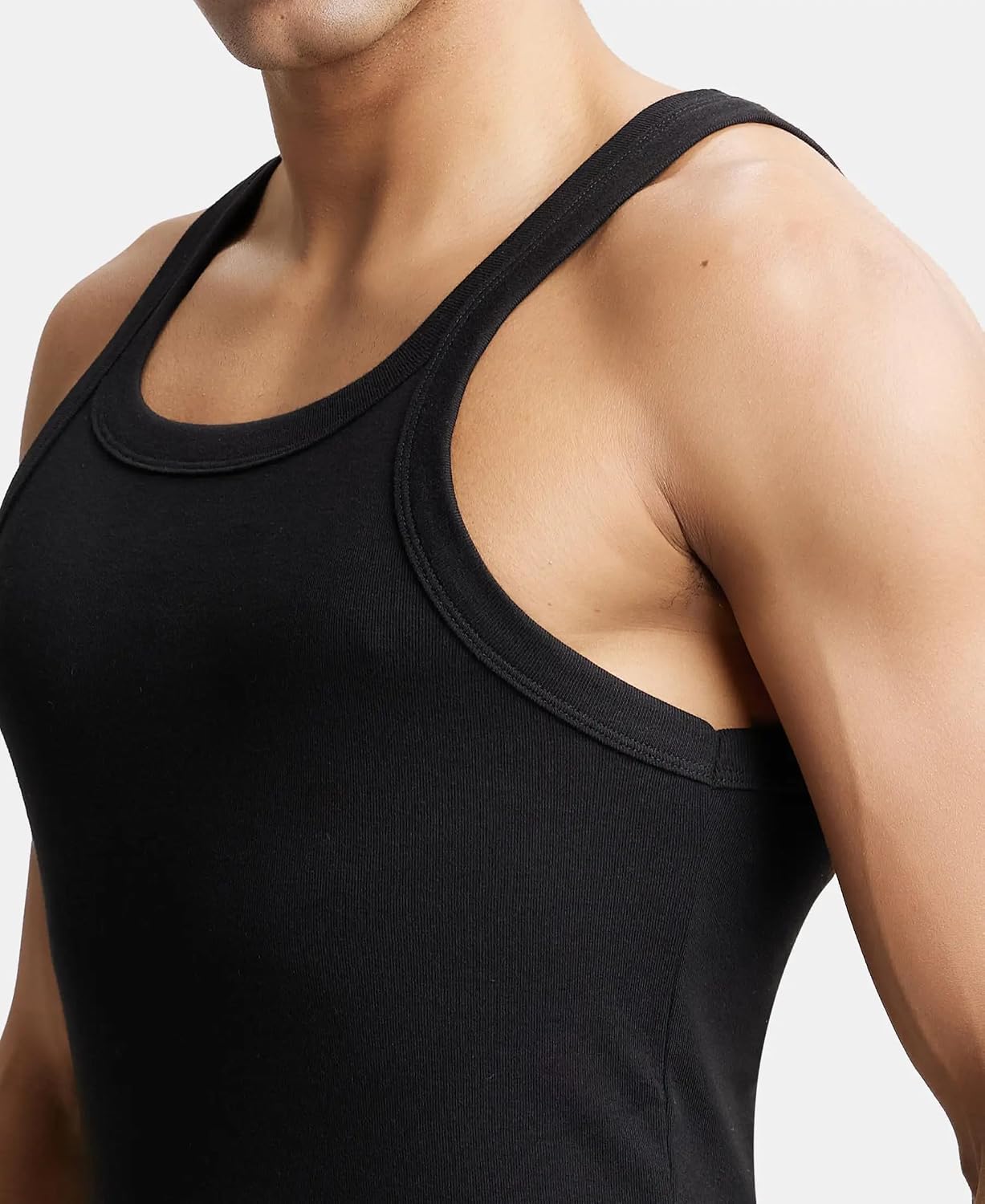 Close-up of the racer-style armhole on a Jockey US26 black vest