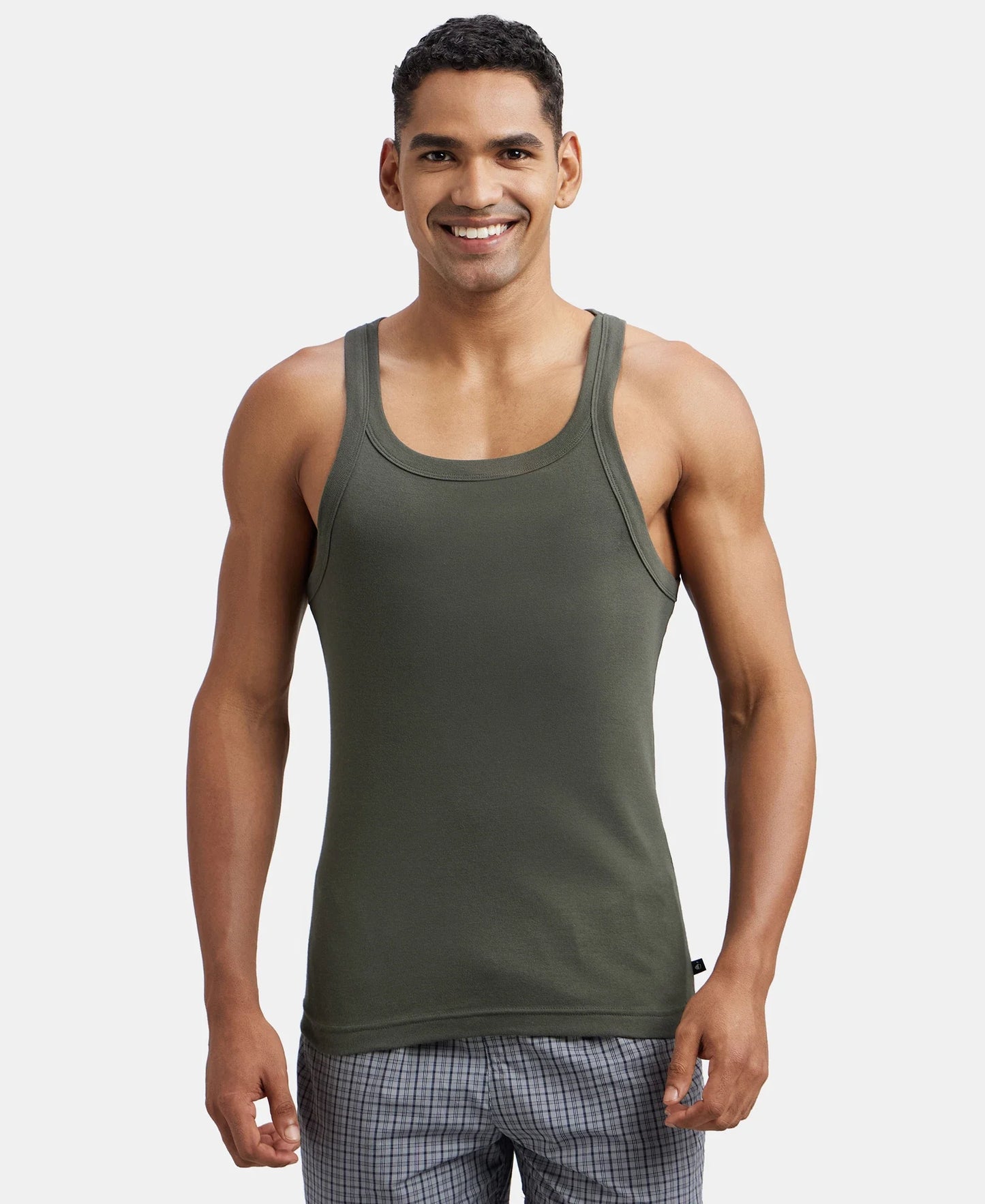 Jockey US26 men's sleeveless cotton vest in deep olive, worn by a model